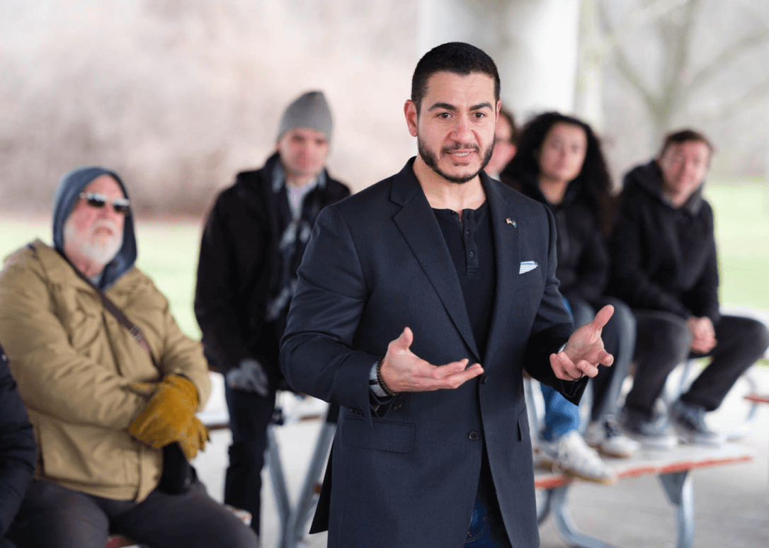 Abdul speaking with voters